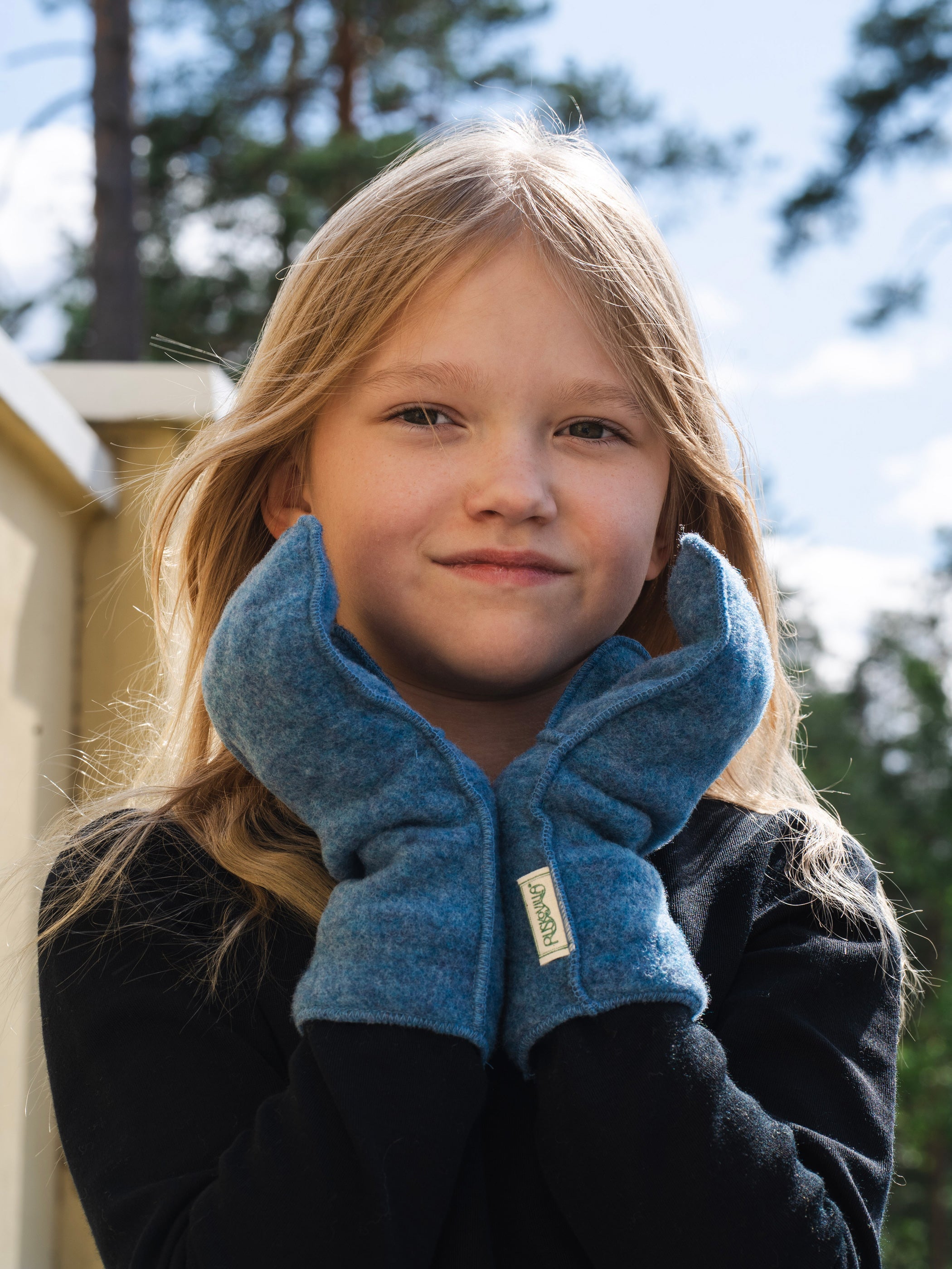 Lasten taivaansiniset villafleecelapaset, Ruskovilla