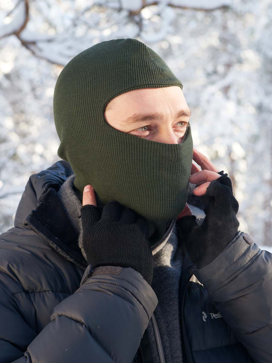 Ruskovilla's organic merino wool protective headwear for adults in green