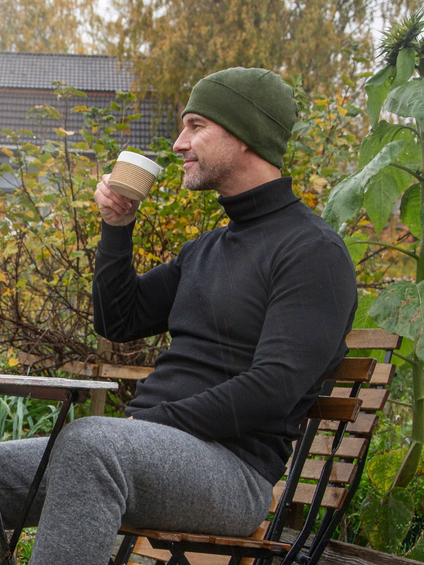 Ruskovilla's organic merino wool beanie for adults in green and red